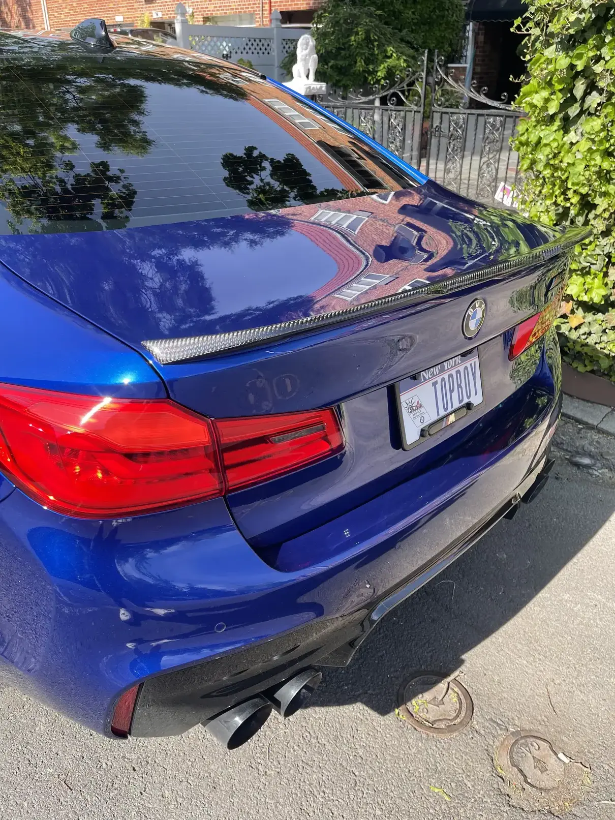 Rear picture of blue BMW m5 after cleaning TOPBOY